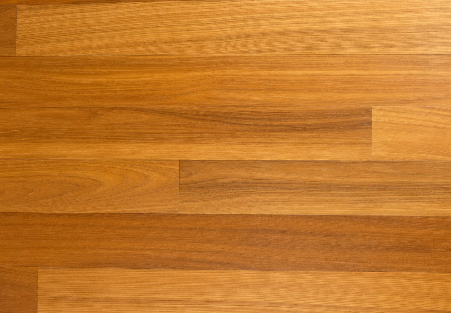 Landhausdiele Teak - edler, langlebiger Holzboden mit natürlicher Maserung, hoher Widerstandsfähigkeit und zeitloser Eleganz.